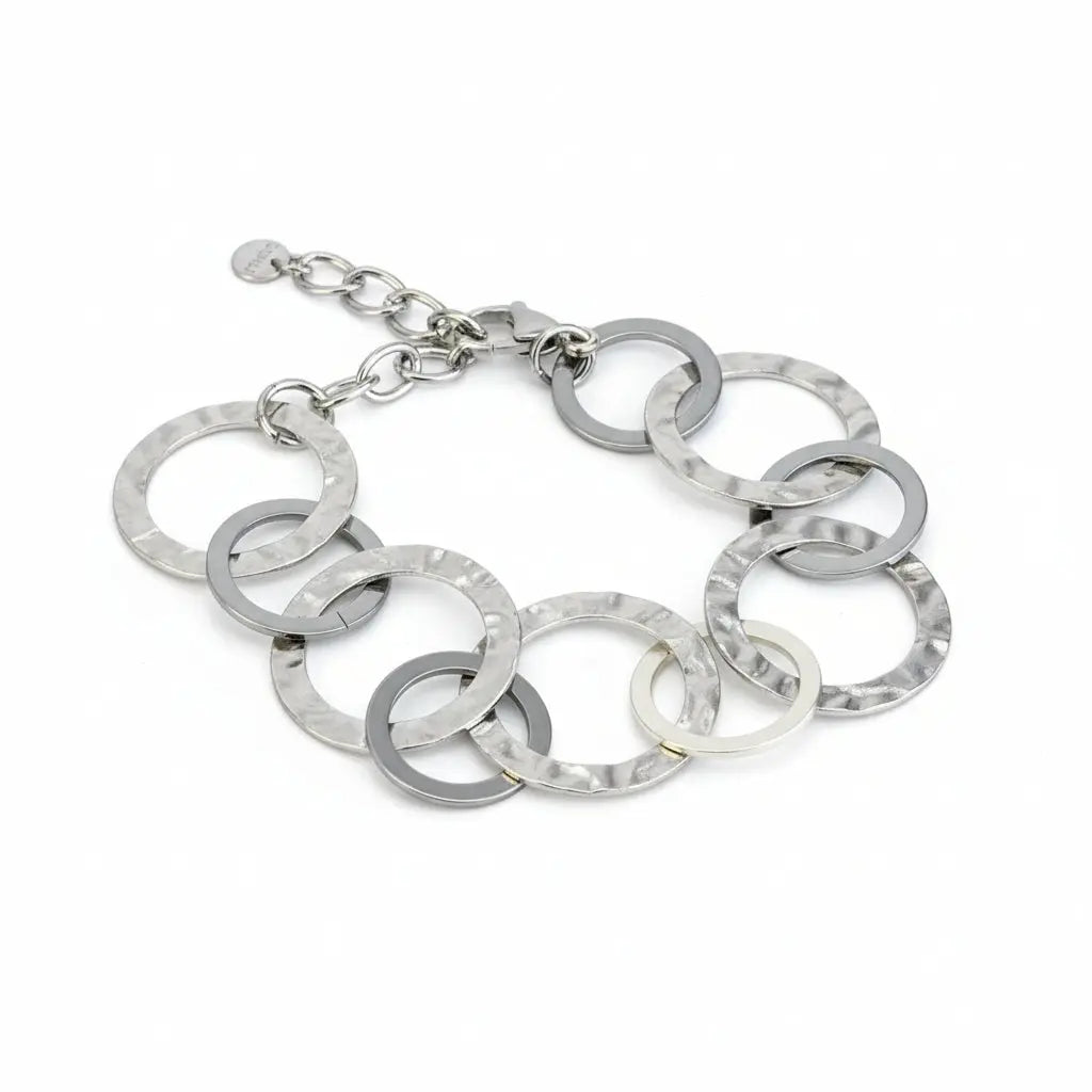 Grey stainless steel linked circle bracelet by Suzie Blue Canada, featuring interconnected circular links for a modern, stylish look.