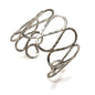 Silver open loop metal cuff bracelet by Suzie Blue Canada featuring a sleek, minimalist design and polished finish.