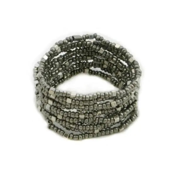 Multi strand stretch cuff bracelet by Suzie Blue Canada featuring layered design and soft fabric strands in neutral tones.
