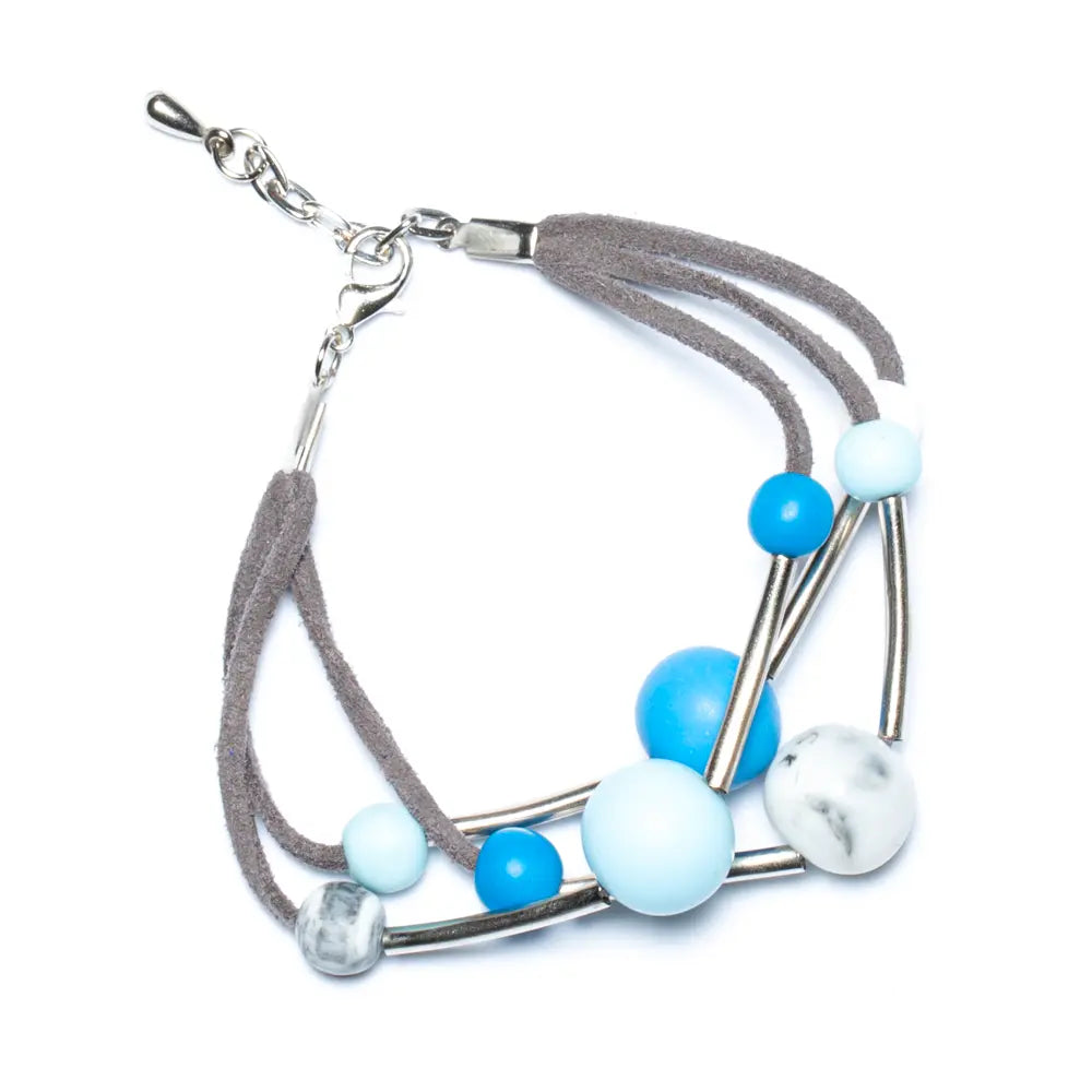 Triple strand resin ball bracelet by Suzie Blue Canada featuring colorful resin beads on a stylish bracelet.