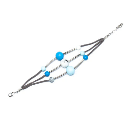 Triple strand resin ball bracelet by Suzie Blue Canada featuring colorful resin beads and adjustable silver clasp.