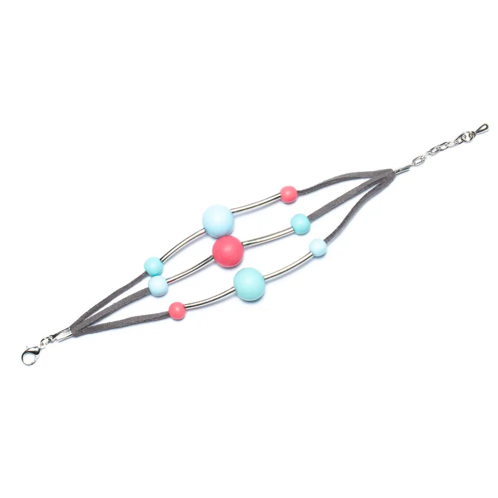 Triple strand resin ball bracelet by Suzie Blue Canada featuring colorful resin beads on a delicate bracelet chain.