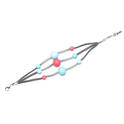 Triple strand resin ball bracelet by Suzie Blue Canada featuring colorful resin beads on a delicate bracelet chain.