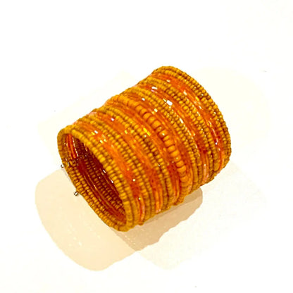 Wide beaded cuff bracelet by Suzie Blue Canada featuring colorful beads and a stylish, unique design.