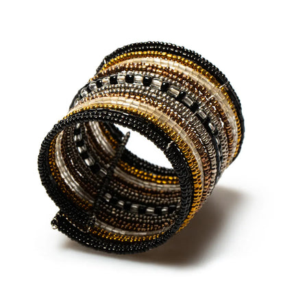 Striped beaded cuff bracelet by Suzie Blue Canada featuring colorful beads and a stylish, unique design for fashion accessories.