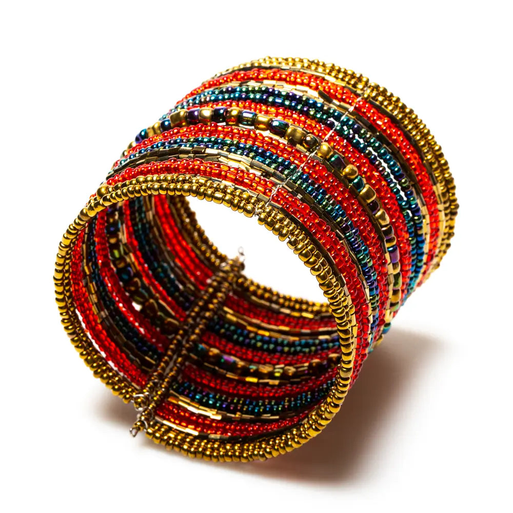 Striped beaded cuff bracelet by Suzie Blue Canada featuring colorful beads and a stylish, unique design.