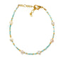 Elegant multi pearl bead bracelet by Suzie Blue Canada featuring white and cream pearls on a delicate silver chain.