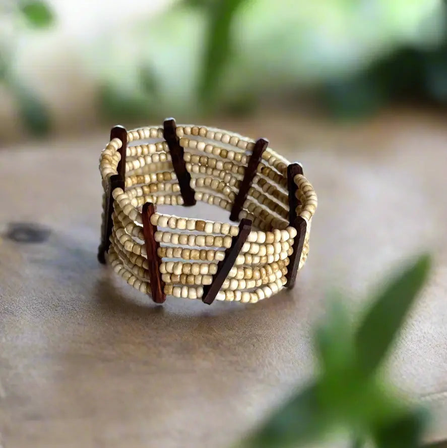 Elasticated bead bracelet with wood detail, handcrafted jewelry by Suzie Blue Canada featuring natural wooden accents and colorful beads.