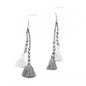 Suzy Blue Canada double tassel earrings with crystal drop, elegant jewelry accessory with gold-toned tassels and sparkling crystal accents.