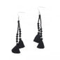 Suzie Blue Canada double tassel earrings with crystal drop, elegant jewelry accessory, featuring gold-tone tassels and sparkling crystal accents.
