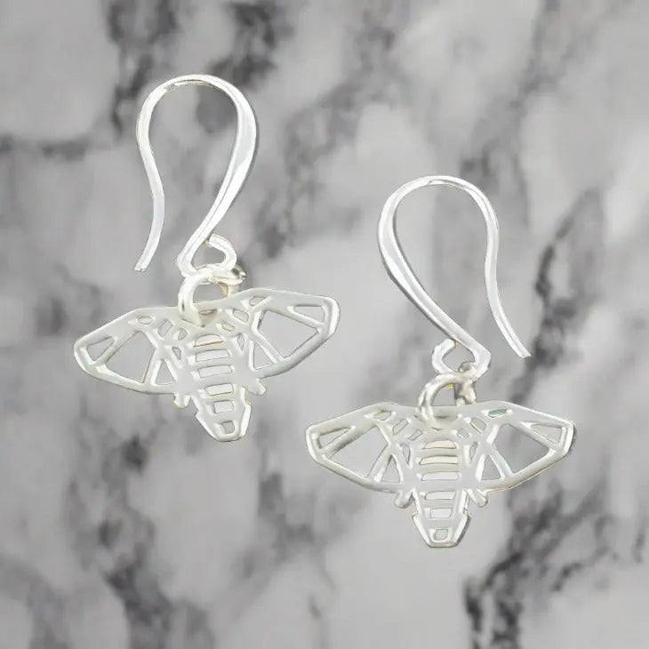 Silver plate elephant charm earrings with detailed elephant design, stylish dangle earrings by Suzie Blue Canada.