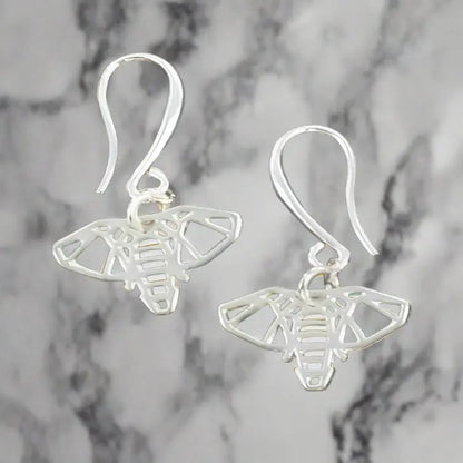 Silver plate elephant charm earrings with detailed elephant design, stylish dangle earrings by Suzie Blue Canada.