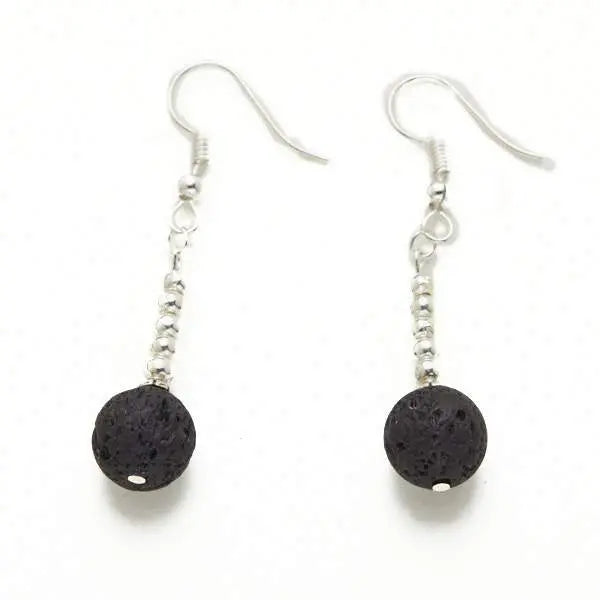 Silver plate lava stone earrings featuring round black lava stones and silver hooks, stylish jewelry by Suzie Blue Canada.