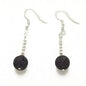 Silver plate lava stone earrings featuring round black lava stones and silver hooks, stylish jewelry by Suzie Blue Canada.