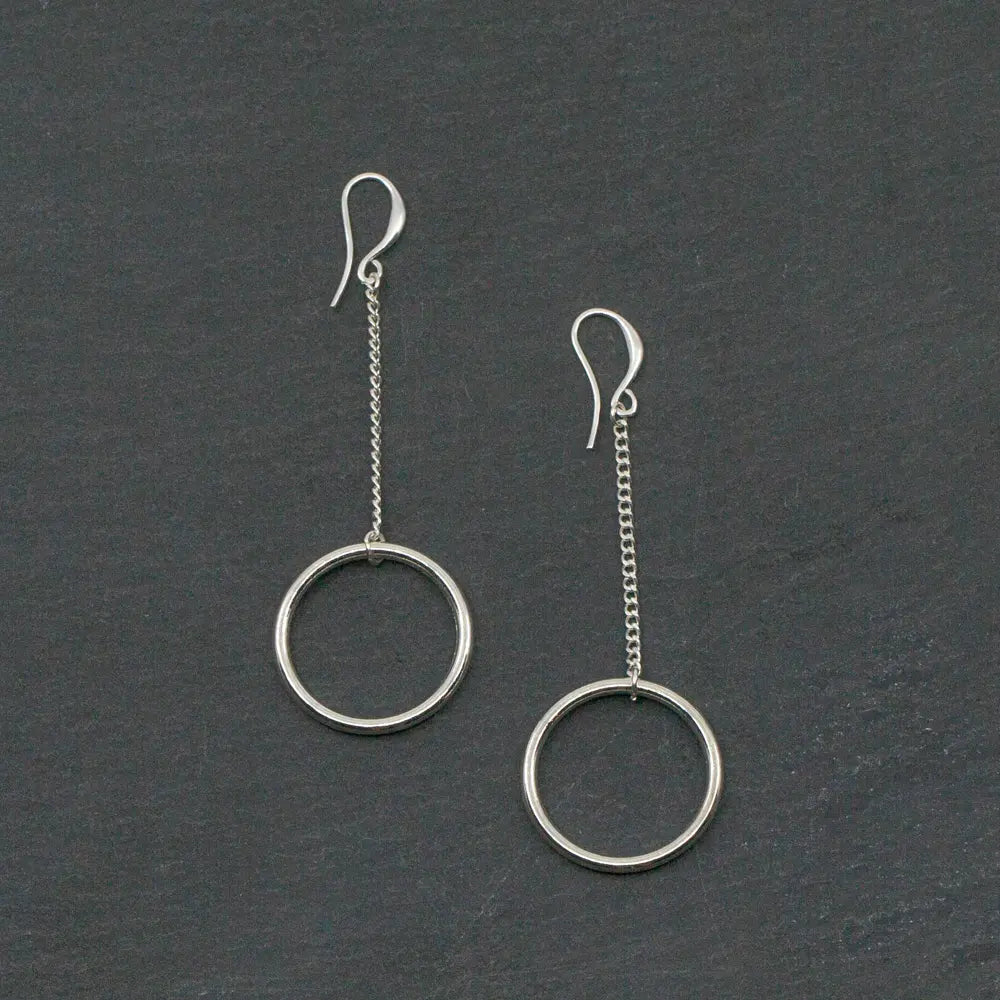 Long drop silver earrings in silver plate featuring elegant, slender design with a polished finish, perfect for stylish occasions.