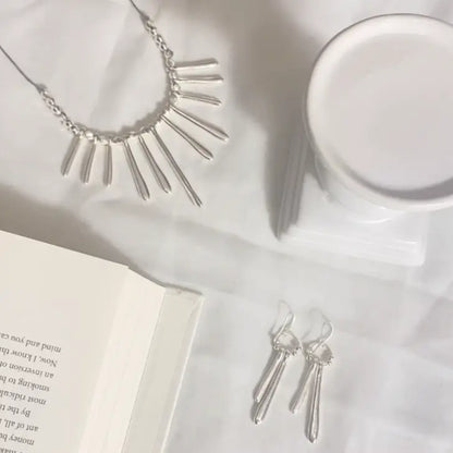 Silver plate double drop earrings by Suzie Blue Canada featuring elegant, layered earring design with a polished finish.