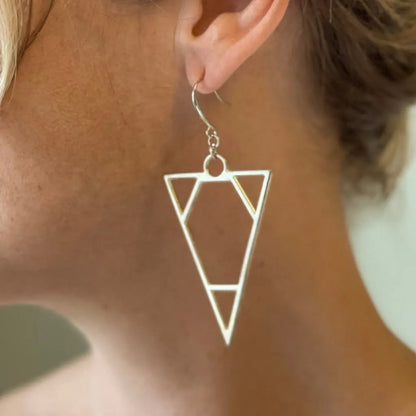 Silver plated triangle earrings by Suzie Blue Canada featuring sleek, geometric design for stylish elegance.