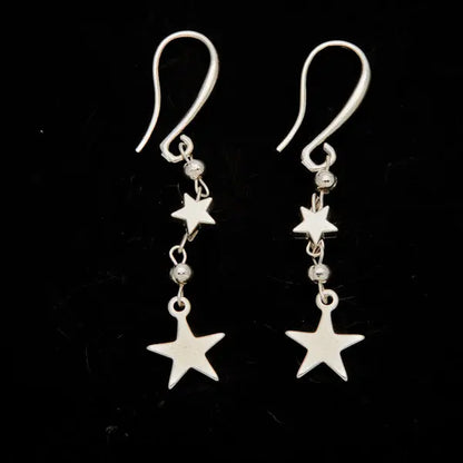 Silver star drop earrings with double drop design by Suzie Blue Canada, featuring charming silver plating and intricate detailing.