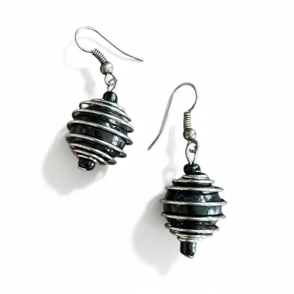 Suzie Blue Canada spiral pearl bead earrings showcasing elegant, dangling jewelry with shiny pearl beads and intricate design.