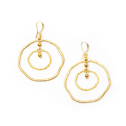 Gold plated beaten double ring earrings by Suzie Blue Canada, featuring textured circular design and stylish earring hooks.