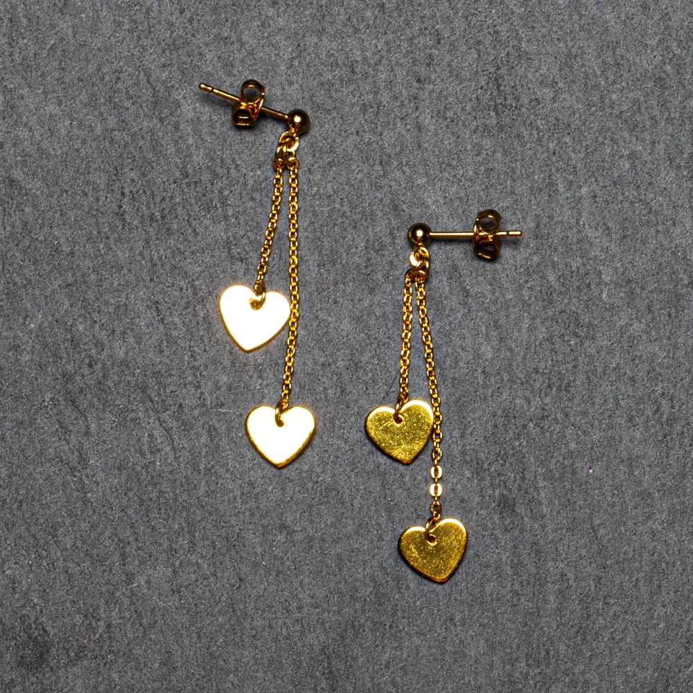 Gold plated double drop heart earrings by Suzie Blue Canada featuring elegant chain stud design.