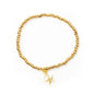 Gold star charm bracelet with elasticated design, gold plating, by Suzie Blue Canada, featuring a delicate star pendant.