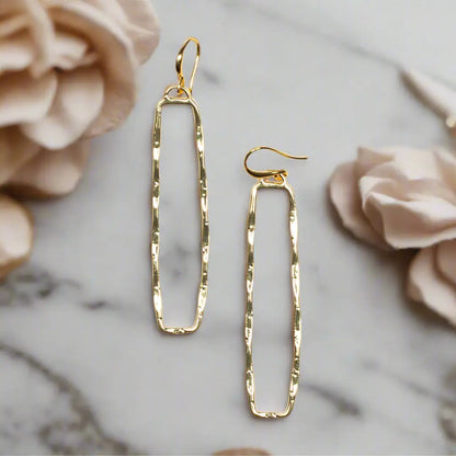Rectangular gold drop earrings by Suzie Blue Canada with elegant gold plate design, showcasing a sleek and stylish jewelry piece.