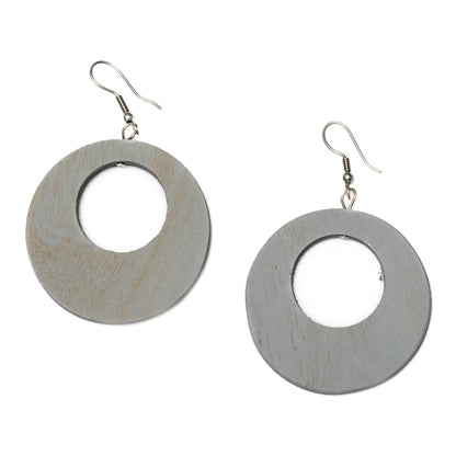 Round wooden hoop earrings by Suzie Blue Canada featuring eco-friendly, stylish design with natural wood finish.