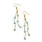 Elegant double drop crystal bead earrings by Suzie Blue Canada featuring sparkling clear beads and silver-tone hooks.