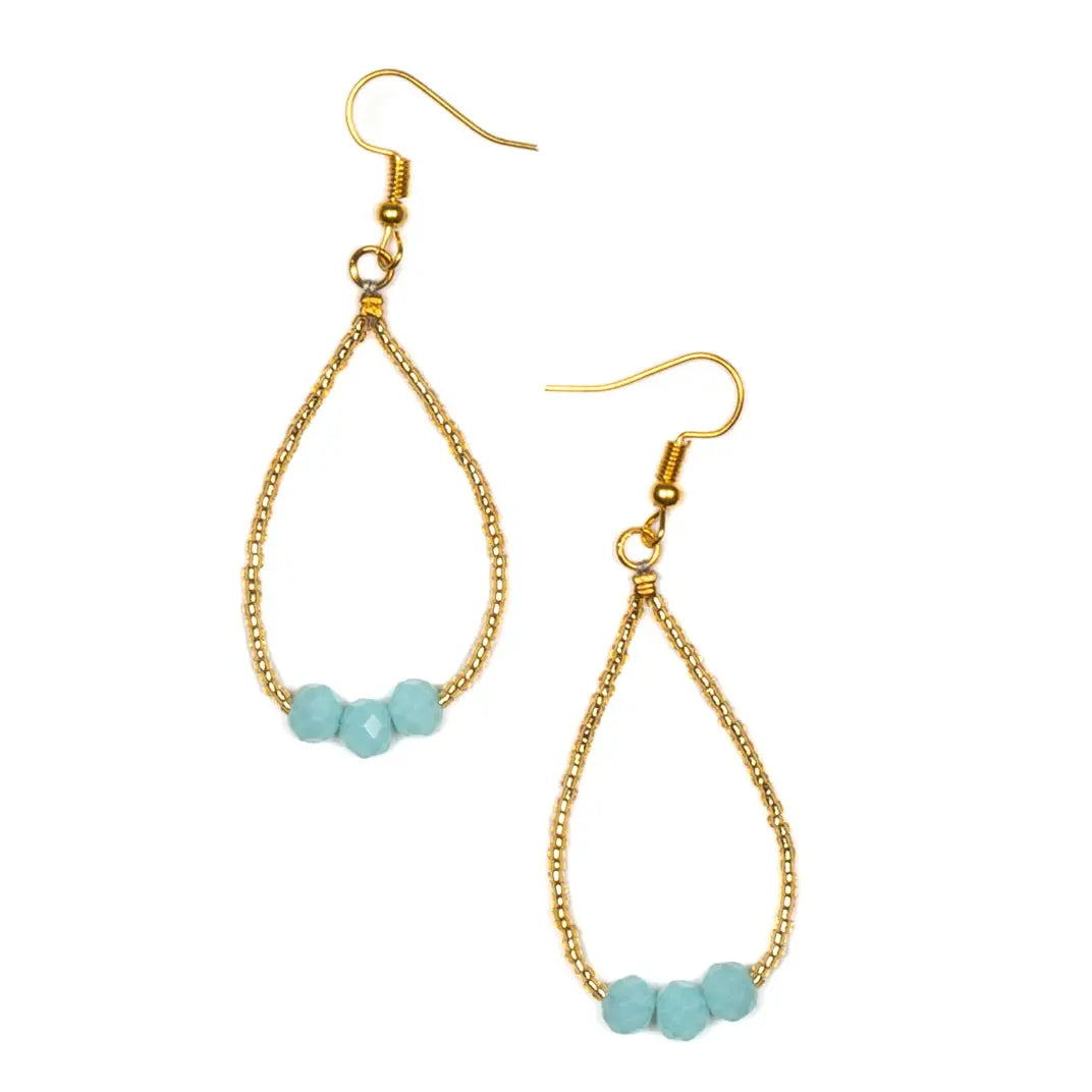 Elegant tear drop crystal bead earrings by Suzie Blue Canada featuring sparkling crystal beads on silver hooks.