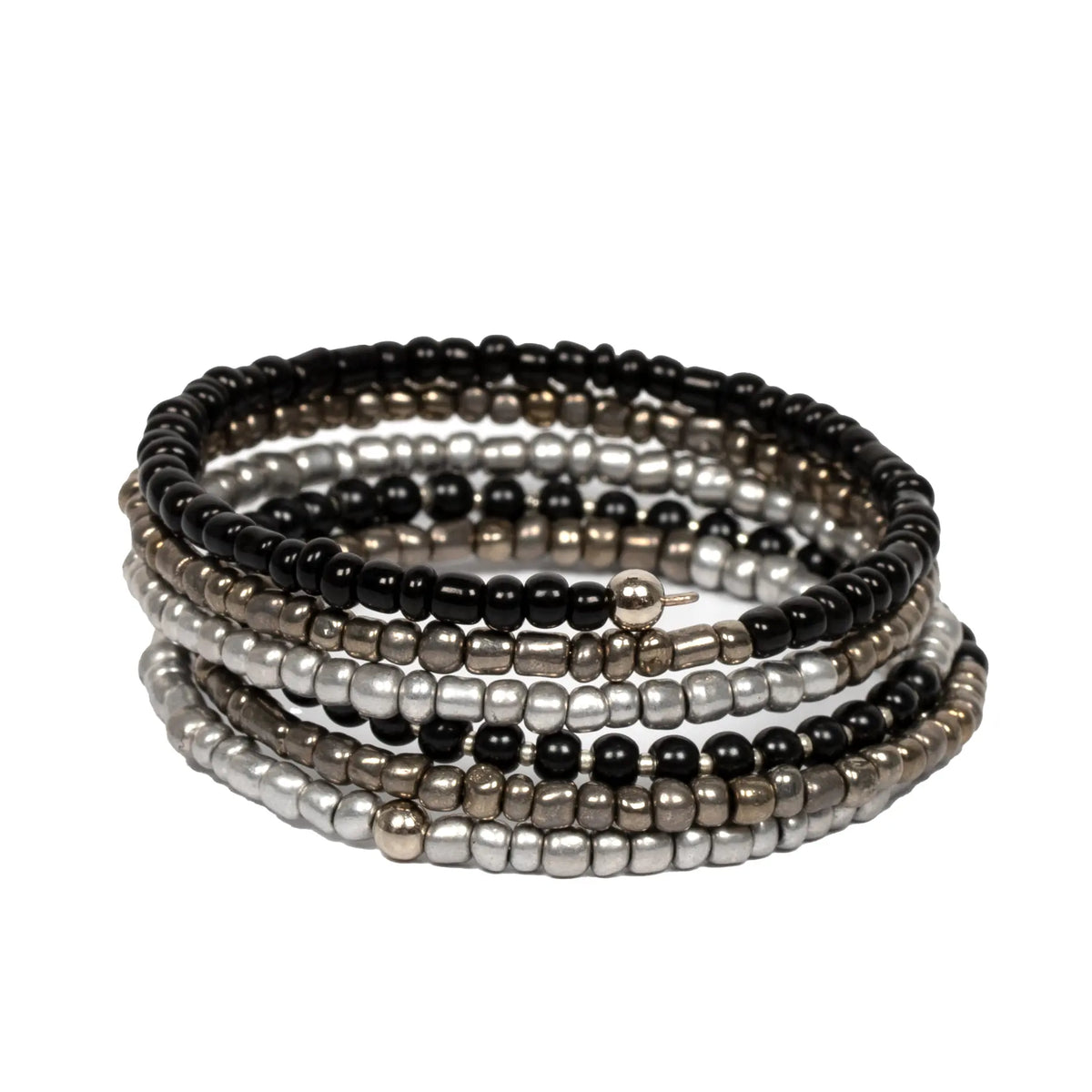 Spiral bead bracelet by Suzie Blue Canada featuring colorful glass beads and a coiled design on a white background