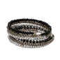 Spiral bead bracelet by Suzie Blue Canada featuring colorful glass beads and a coiled design on a white background