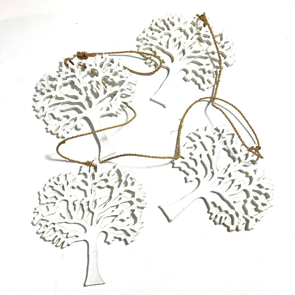String of five white wooden trees for home decor, featuring elegant white wooden tree design by Suzie Blue Canada.