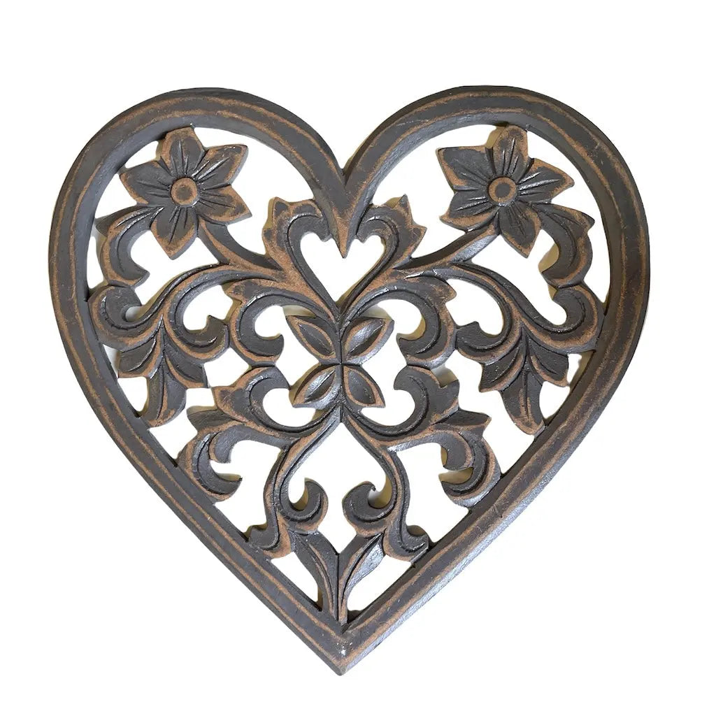 Wooden carved heart decoration for home decor by Suzie Blue Canada, featuring intricate craftsmanship and natural wood finish.