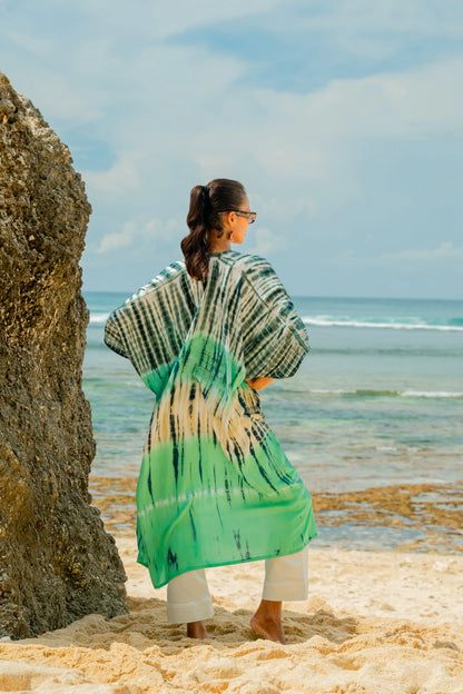 Turquoise and grey tie-dye kimono by Suzie Blue Canada, stylish long kimono for fashionable outfits, flowing fabric and relaxed fit.