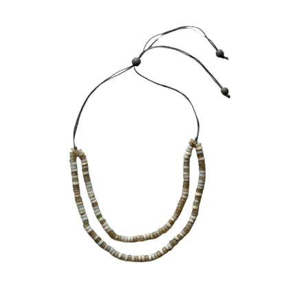 Double strand glass bead necklace by Suzie Blue Canada featuring colorful, shimmering glass beads on a delicate chain.