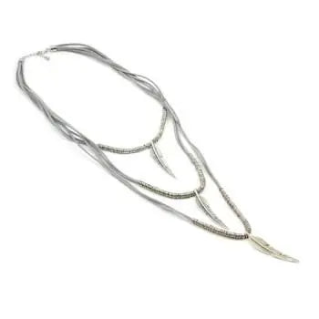 Suzie Blue Canada suede feather necklace with elegant feather pendant, featuring soft suede cord and stylish feather design.
