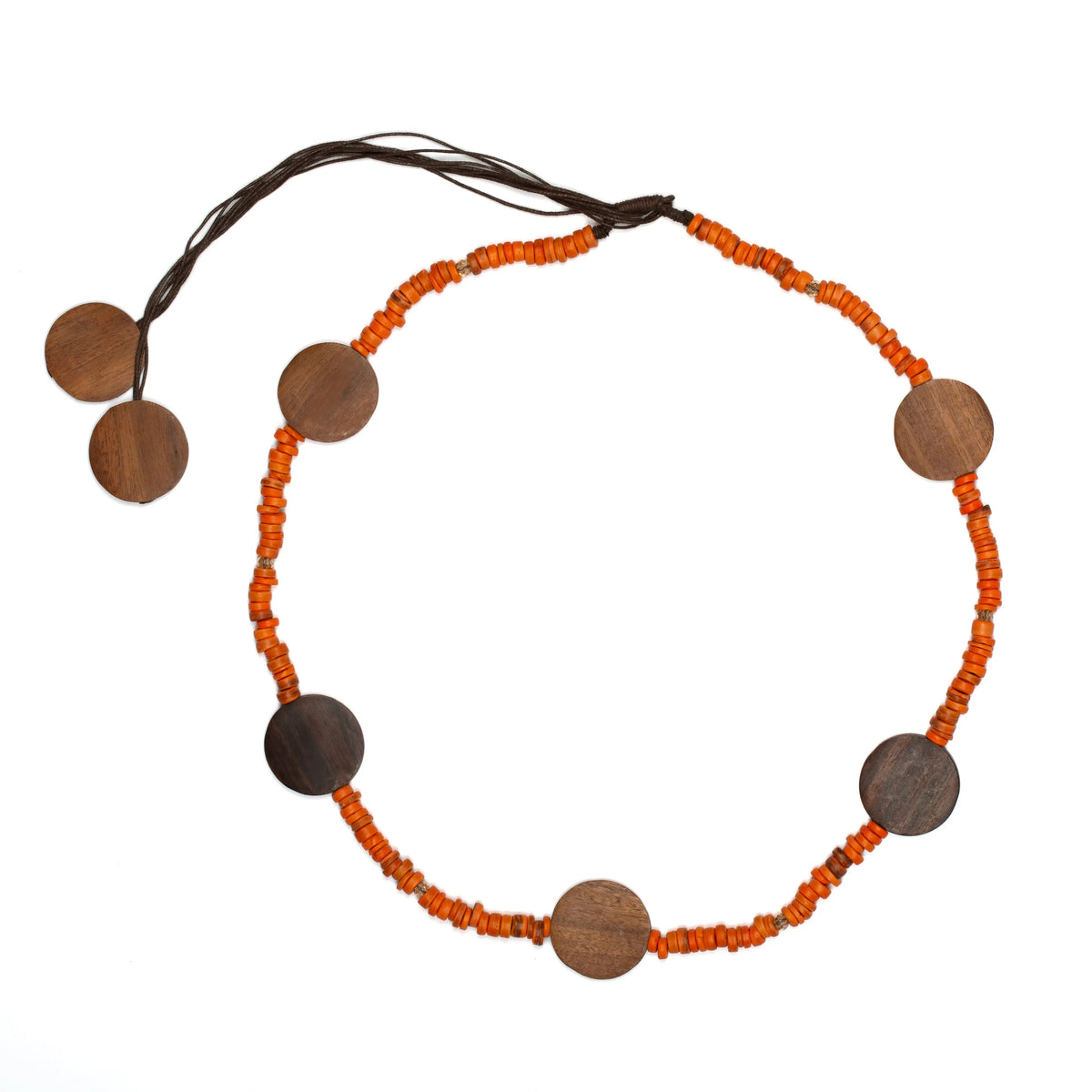 Long coconut bead necklace with wooden discs from Suzie Blue Canada, featuring natural earthy tones and bohemian style.