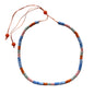 Single strand glass bead necklace by Suzie Blue Canada featuring colorful, round glass beads on a delicate chain.