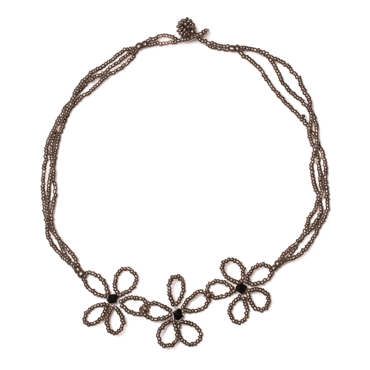 Beaded flower necklace by Suzie Blue Canada featuring colorful beads and floral design, close-up view of the jewelry.