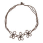 Beaded flower necklace by Suzie Blue Canada featuring colorful beads and floral design, close-up view of the jewelry.