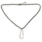 Hammered oval silver plate pendant necklace on ball chain, crafted by Suzie Blue Canada, showcasing a textured, stylish jewelry piece.