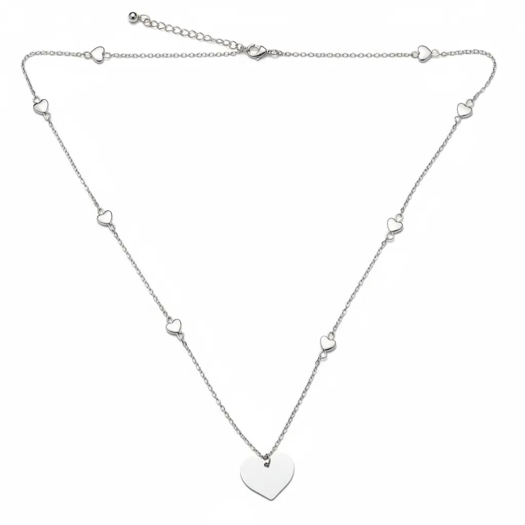 Silver-plated heart chain necklace with an elegant heart-on-heart design by Suzie Blue Canada.