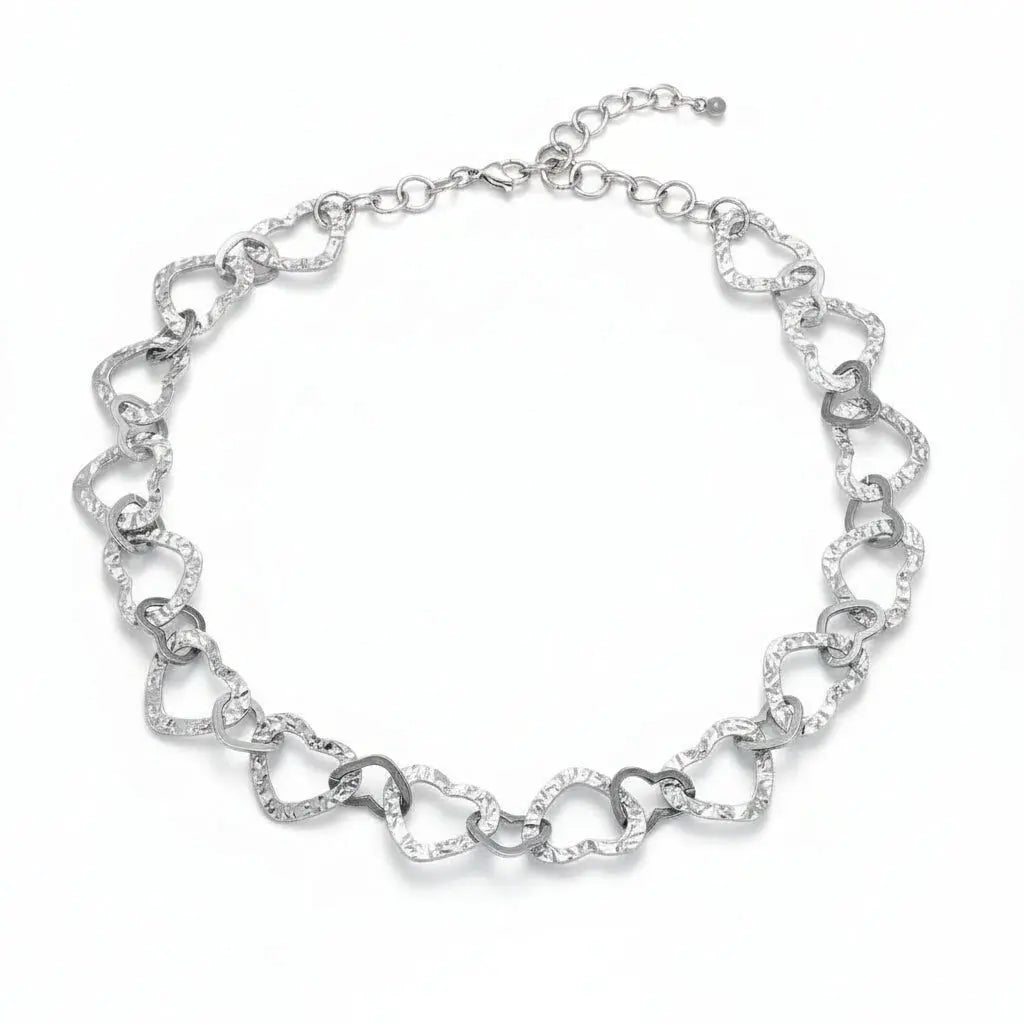 Grey stainless steel linked heart necklace from Suzie Blue Canada, showcasing a delicate chain with interconnected heart charms.