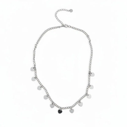 Silver stainless steel multi-heart charm necklace featuring layered heart pendants, designed by Suzie Blue Canada.