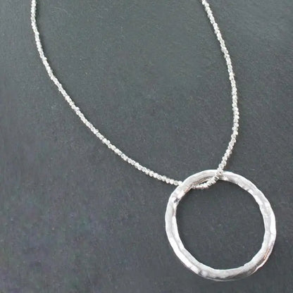 Silver plated open ring necklace from Suzie Blue Canada featuring a minimalist and elegant jewelry design.