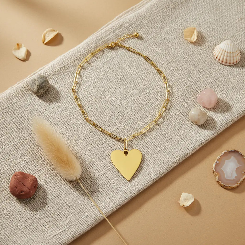 Gold stainless steel chainlink heart pendant necklace with a sleek design, perfect for gift-giving or everyday wear.