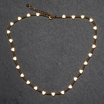 Gold-plated short heart necklace by Suzie Blue Canada featuring a delicate pendant for elegant style.