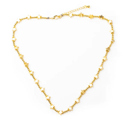 Gold-plated short star necklace by Suzie Blue Canada featuring a delicate star pendant for elegant everyday wear.