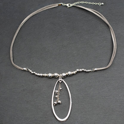 Silver beaded pendant necklace with suede strap and oval silver plate, stylish jewelry by Suzie Blue Canada